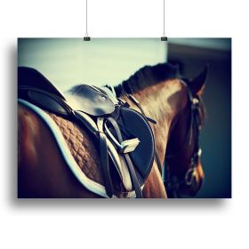 Saddle with stirrups on a back of a brown horse Canvas Print or Poster (Type: Standard Framed Canvas Print, size: 40" x 26" / 100cm x 65cm (approx))